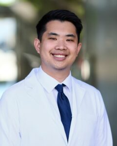 A professional headshot of Dr. Felix Hong